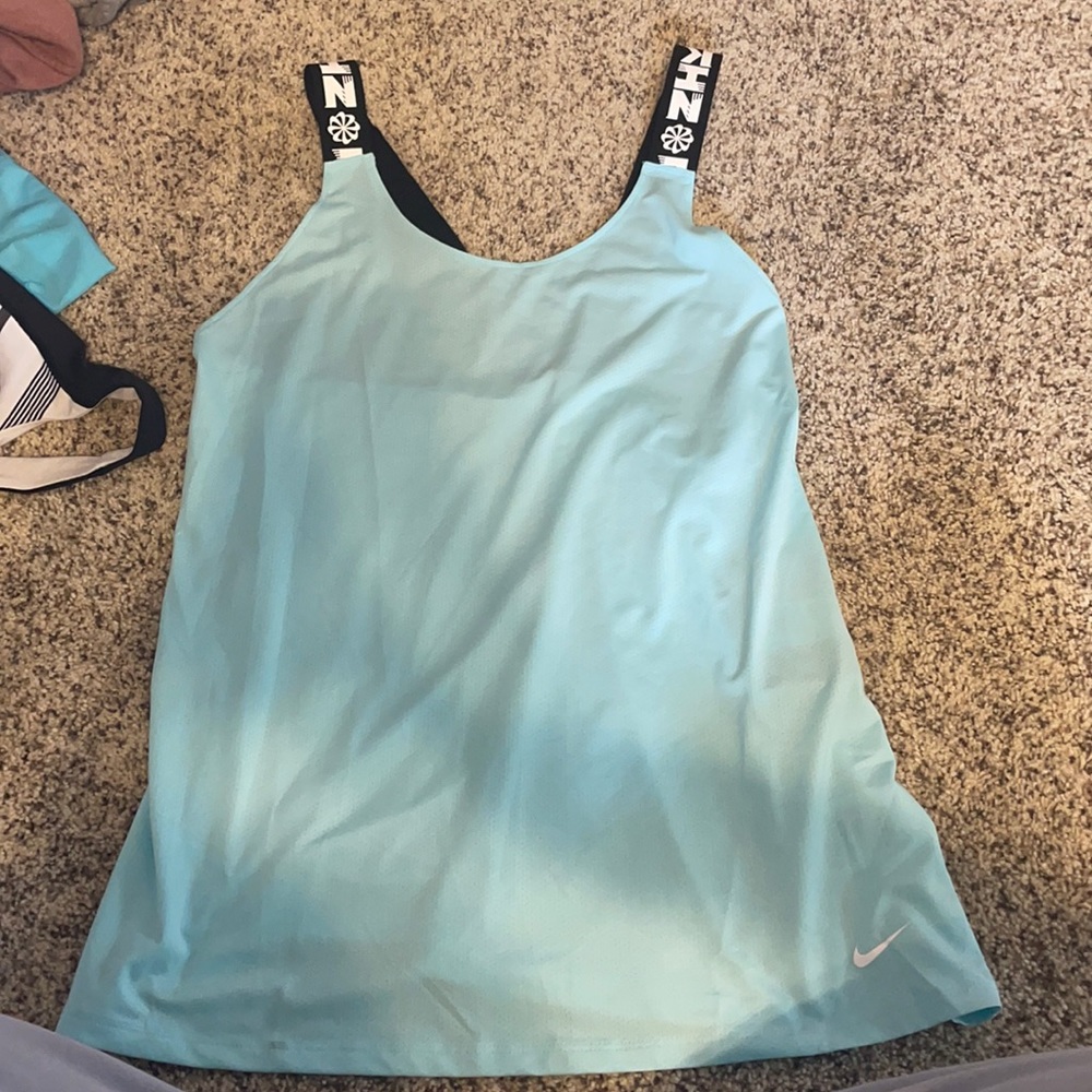 Nike light blue tank top. open back